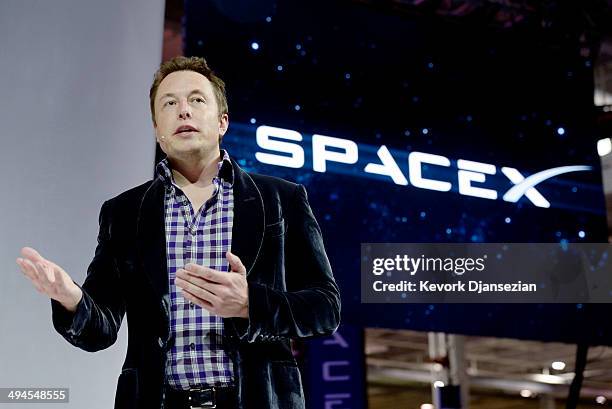 SpaceX CEO Elon Musk unveils the company's new manned spacecraft, The Dragon V2, designed to carry astronauts into space during a news conference on...