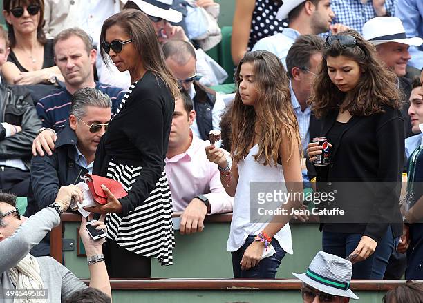 Karine Le Marchand and her daughter Alya attend Day 5 of the French Open 2014 held at Roland-Garros stadium on May 29, 2014 in Paris, France.