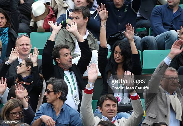 Arnaud Lagardere and his wife Jade Lagardere attend Day 5 of the French Open 2014 held at Roland-Garros stadium on May 29, 2014 in Paris, France.