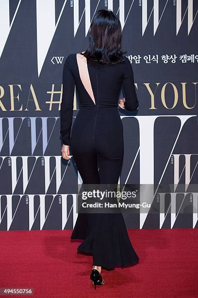 Model Jang Yoon-Ju poses for photographs at the W Magazine Korea Breast Cancer Awareness Campaign 'Love Your W' photo call on October 27, 2015 in...