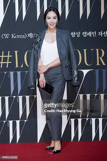 South Korean TV personality Park Ji-Yoon poses for photographs at the W Magazine Korea Breast Cancer Awareness Campaign 'Love Your W' photo call on...