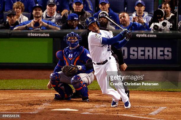 Alcides Escobar of the Kansas City Royals hits an inside-the-park home run in the first inning against the New York Mets during Game One of the 2015...