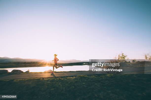 female running on path during sunset in utah - blurred motion bildbanksfoton och bilder