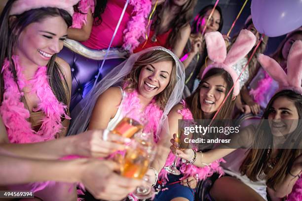 girls making a toast at a bachelorette party - veil stock pictures, royalty-free photos & images