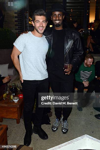 Alex Mytton and Mason Smillie attend the launch of Wringer & Mangle bar and restaurant on October 27, 2015 in London, England.