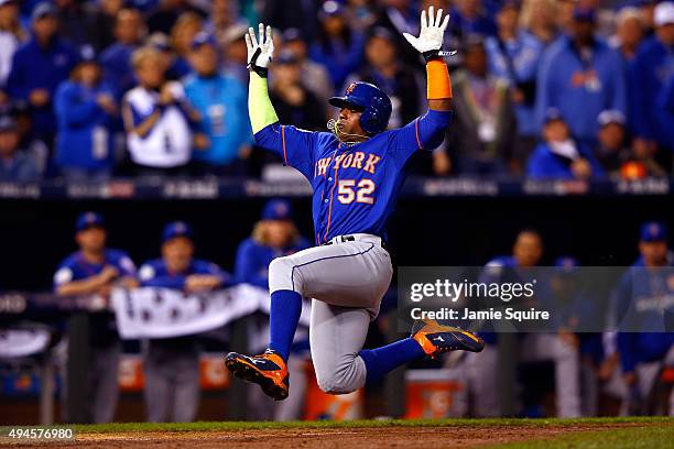 Yoenis Cespedes of the New York Mets scores a run in the sixth inning against the Kansas City Royals during Game One of the 2015 World Series at...