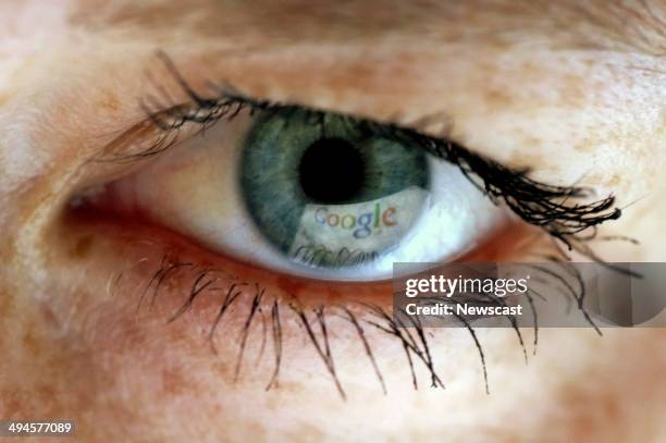 The Google search engine webpage being reflected in an eye.