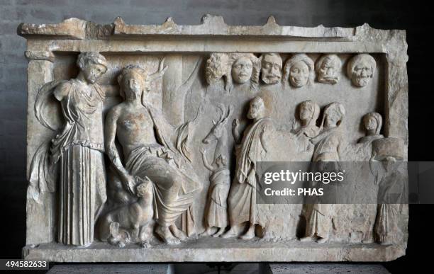 Votive stele depicting a sacrificial procession to Dionysus and Artemis for the win in a contest of theater. Votive offering, ca. 360 BC. Glyptothek....