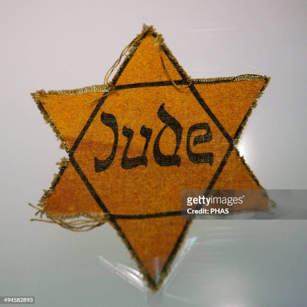 Star worn by Jewish prisoners. Sachsenhausen concentration camp Museum. Oranienburg. Germany.