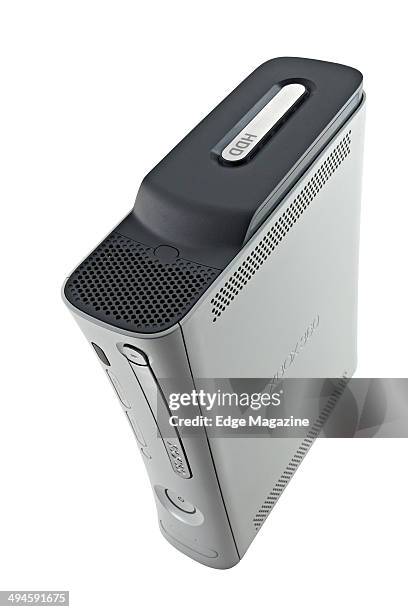 Portrait of a Microsoft Xbox 360 video game console photographed on a white background, taken on August 2, 2013.