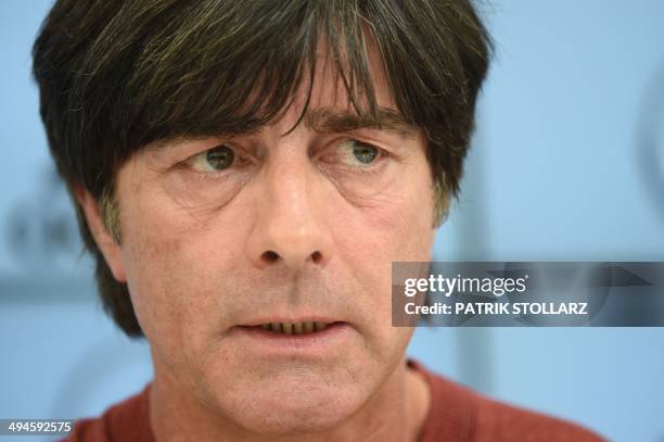 Germany's football head coach Joachim Loew answers journalists' questions during a press conference of the German national football team in San...