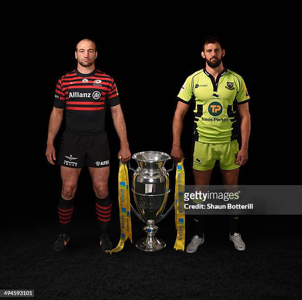 In this composite photo illustration, Steve Borthwick of Saracens and Tom Wood of Northampton Saints pose with the Aviva Premiership Trophy. Saracens...