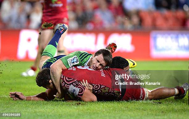 Jake Schatz of the Reds scores the match winning try during the round 16 Super Rugby match between the Reds and the Highlanders at Suncorp Stadium on...