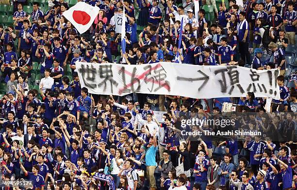 Japanese supporters cheer during the Kirin Challenge Cup international friendly match between Japan and Cyprus at Saitama Stadium on May 27, 2014 in...