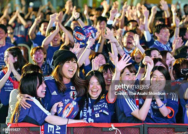 Supporters of Japan cheer during the public viewing of the Kirin Challenge Cup international friendly match between Japan and Cyprus at Umekita...