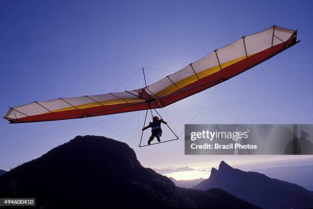 Hang-glider over Rio de Janeiro mountains in a sunny day, Brazil.