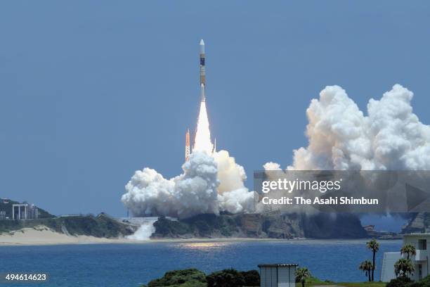 The H-2A Launch Vehicle No. 24 lifts off from the Tanegashima Space Center on May 24, 2014 in Minamitane, Kagoshima, Japan. The Japan Aerospace...