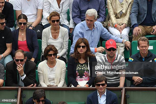 Mirka Federer, wife of Roger Federer of Switzerland and Stefan Edberg watch his men's singles match against Dmitry Tursunov of Russia on day six of...