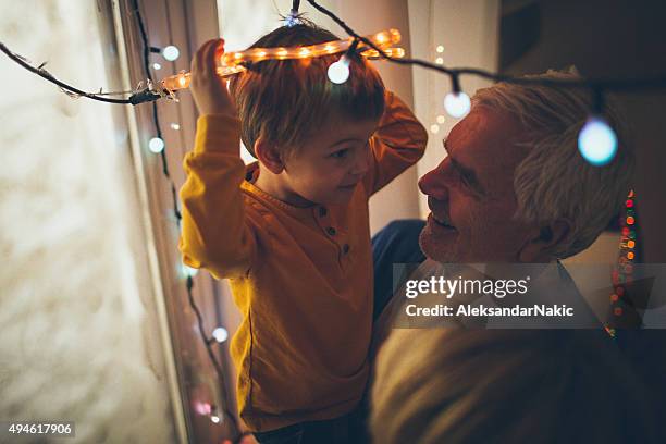 christmas decoration with my grandparents - grandfather silhouette stockfoto's en -beelden