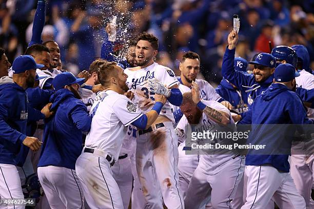 Eric Hosmer of the Kansas City Royals celebrates with teammates after defeating the New York Mets 5-4 in Game One of the 2015 World Series at...