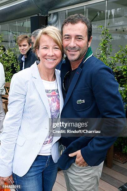 5l6r) Journalist Ariane Massenet and Bernard Montiel attend the Roland Garros French Tennis Open 2014 - Day 6 on May 30, 2014 in Paris, France.