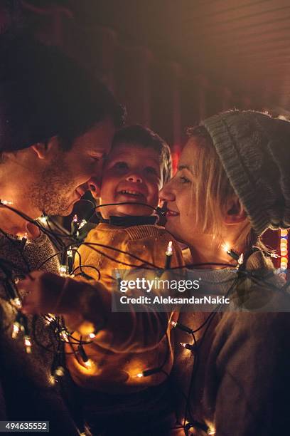 christmas decorating - new year's eve children stock pictures, royalty-free photos & images