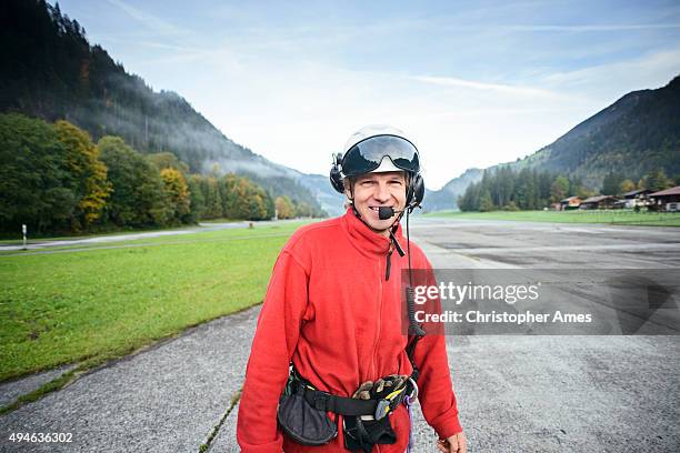 helicopter mountain rescue paramedic at aerodrome - helicopter rescue stock pictures, royalty-free photos & images