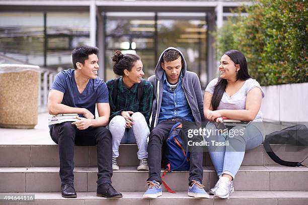 taking it easy on campus - varsity stock pictures, royalty-free photos & images