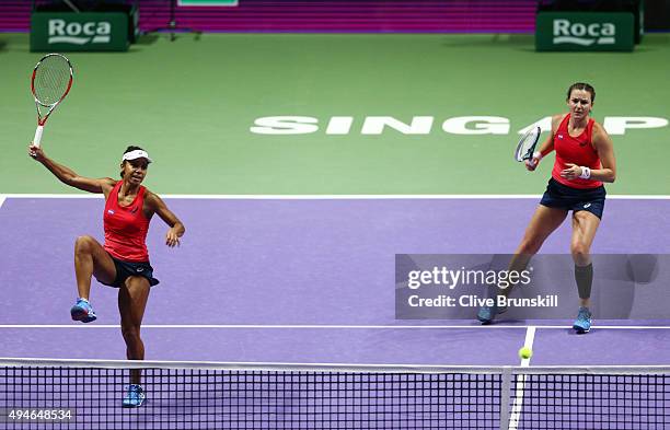 Raquel Kops-Jones and Abigail Spears of the USA in action against Timea Babos of Hungary and Kristina Mladenovic of France in a doubles round robin...