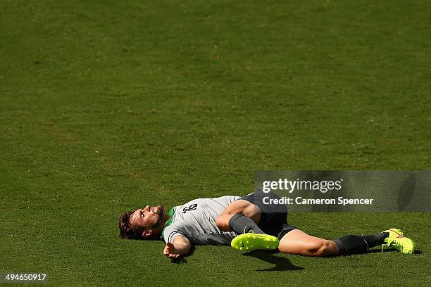 James Holland of the Socceroos stretches during an Australian Socceroos training session at Arena Unimed Sicoob on May 30, 2014 in Vitoria, Brazil.