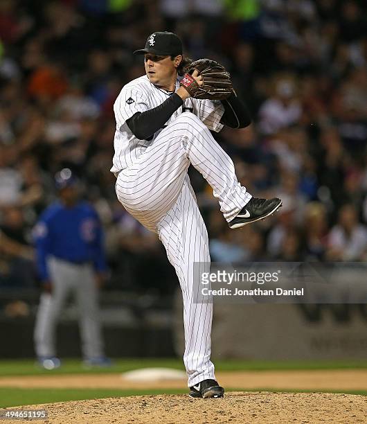 Scott Downs of the Chicago White Sox pitches against the Chicago Cubs at U.S. Cellular Field on May 8, 2014 in Chicago, Illinois. The Cubs defeated...