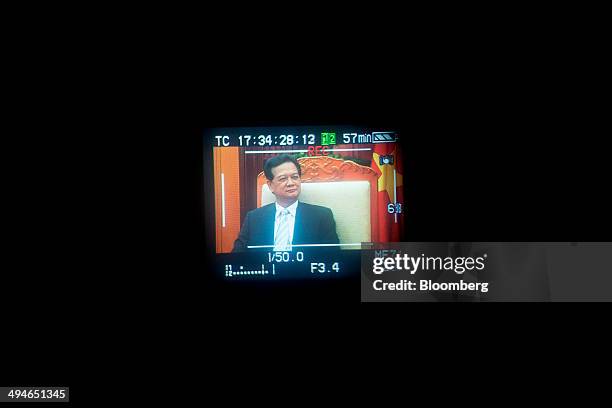 Nguyen Tan Dung, Vietnam's prime minister, is seen on a camera viewfinder during an interview in Hanoi, Vietnam, on Friday, May 30, 2014. Vietnam has...