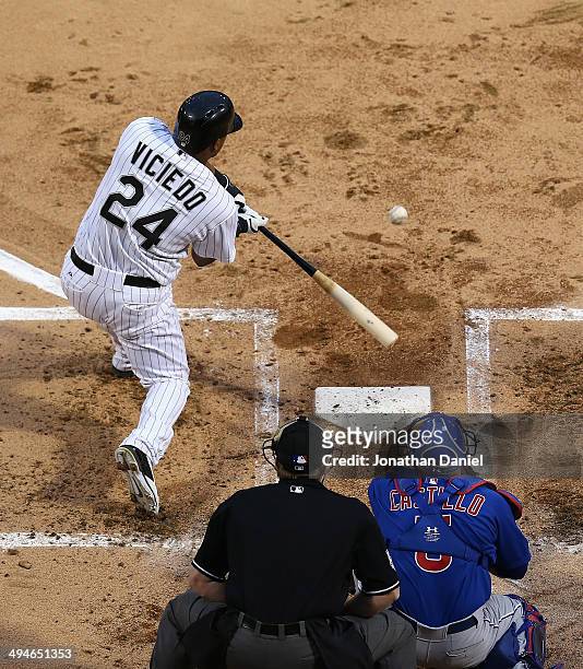 Dayan Viciedo of the Chicago White Sox bats against the Chicago Cubs at U.S. Cellular Field on May 8, 2014 in Chicago, Illinois. The Cubs defeated...