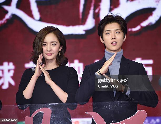 Singer and actor Lu Han, actress Yang Mi attend the press conference of film "The Witness" on October 28, 2015 in Beijing, China.