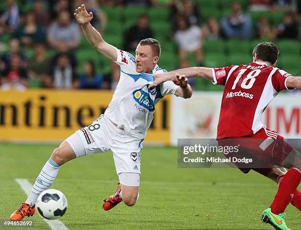 Besart Berisha of the Victory is given a penalty after this contest with Bradley Walker of the City during the FFA Cup Semi Final match between Hume...