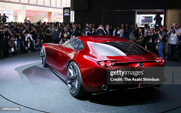 Journalists gather around Mazda Motor Co's RX-Vision during the Tokyo Motor Show at Tokyo Big Sight on October 28, 2015 in Tokyo, Japan. 160...