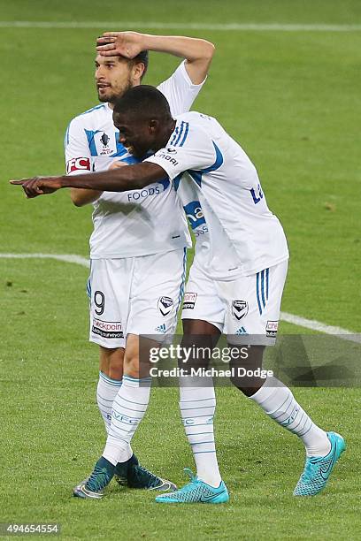 Kosta Barbarouses of the Victory celebrates a goal with Jason Geria during the FFA Cup Semi Final match between Hume City and Melbourne Victory at...