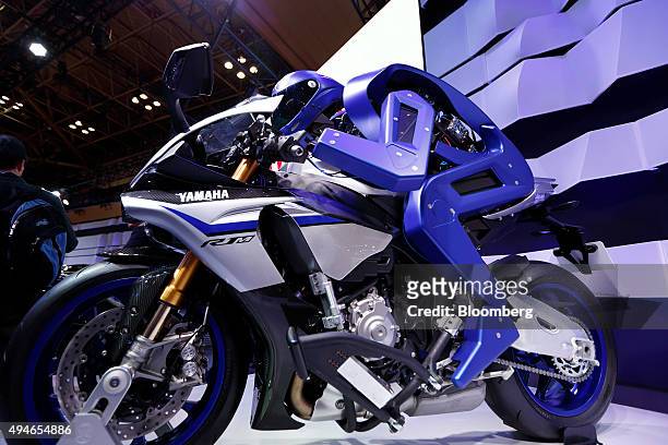 The Yamaha Motor Co. Motobot sits on the company's R1M motorcycle at the Tokyo Motor Show in Tokyo, Japan, on Wednesday, Oct. 28, 2015. Toyota Motor...