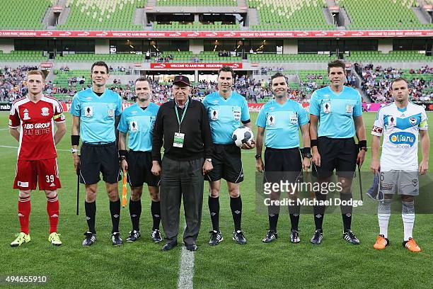 Captains Nick Hegarty of the City and Leigh Broxham of the Victory pose with the referees and the coin toss winner during the FFA Cup Semi Final...