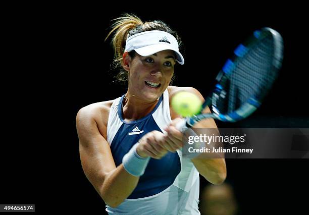 Garbine Muguruza of Spain in action against Angelique Kerber of Germany during the BNP Paribas WTA Finals at Singapore Sports Hub on October 28, 2015...