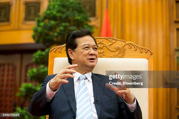 Nguyen Tan Dung, Vietnam's prime minister, gestures while he speaks during an interview in Hanoi, Vietnam, on Friday, May 30, 2014. Vietnam has...