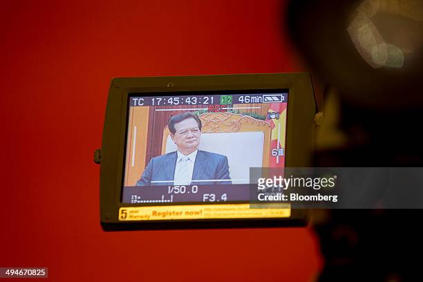 Nguyen Tan Dung, Vietnam's prime minister, is seen on a camera viewfinder during an interview in Hanoi, Vietnam, on Friday, May 30, 2014. Vietnam has...