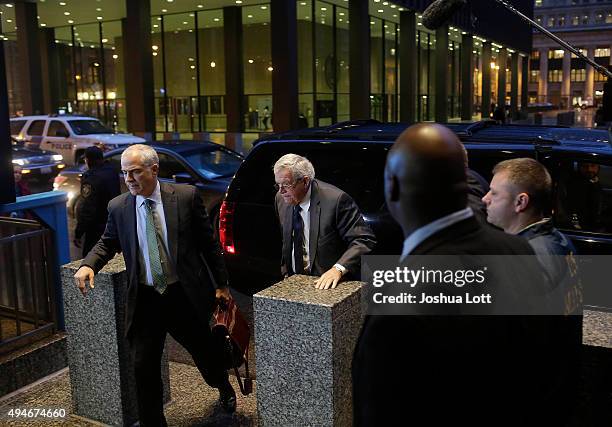 Former Republican Speaker of the House Dennis Hastert, second from left, arrives for his plea deal at the Dirksen Federal Courthouse on October 28,...