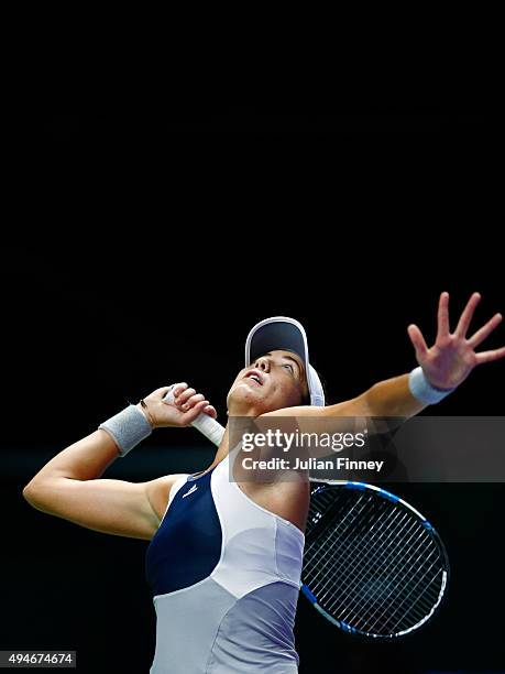 Garbine Muguruza of Spain in action against Angelique Kerber of Germany during the BNP Paribas WTA Finals at Singapore Sports Hub on October 28, 2015...