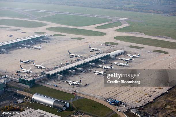 Passenger aircraft operated by Ryanair Holdings Plc sit on the tarmac at London Stansted Airport Ltd, operated by Manchester Airports Group Plc , in...