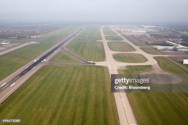 Passenger aircraft operated by Ryanair Holdings Plc exits the runway after landing at London Stansted Airport Ltd, operated by Manchester Airports...