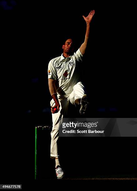 John Hastings of Victoria bowls with the pink cricket ball during day one of the Sheffield Shield match between Victoria and Queensland at Melbourne...