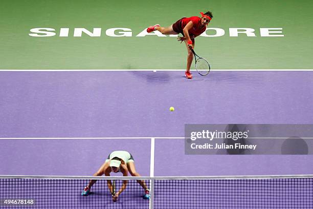 Sania Mirza of India and Martina Hingis of Switzerland in action against Andrea Hlavackova of Czech Republic and Lucie Hradecka of Czech Republic...