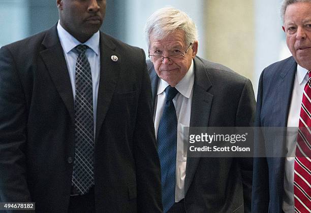 Surrounded by U.S. Marshals, former Republican Speaker of the House Dennis Hastert leaves the Dirksen Federal Courthouse on October 28, 2015 in...