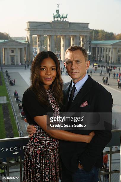 Naomie Harris and Daniel Craig pose with the Brandenburg Gate behind during a photocall prior the German premiere of the new James Bond movie...